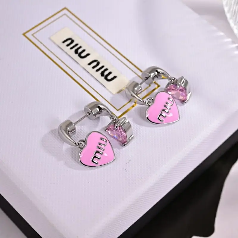 miu miu boucles doreilles pour femme s_1252022